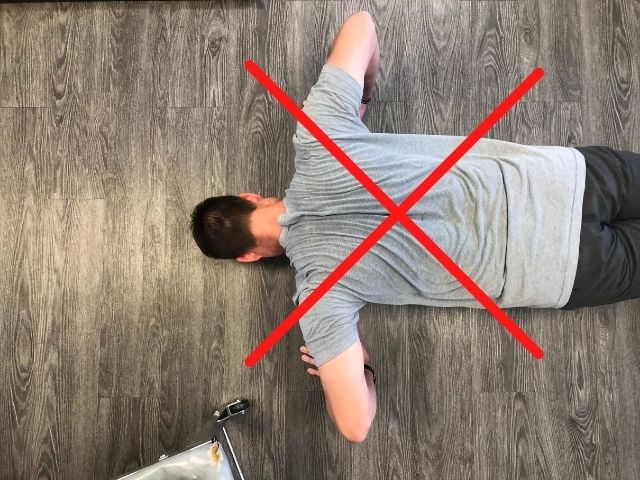 A bad elbow position for the pushup.