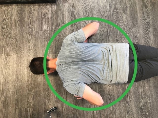 A good elbow position in the bottom of the pushup.