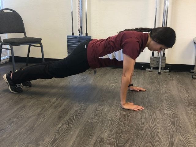 Proper hand and hip position for the start of the pushup.