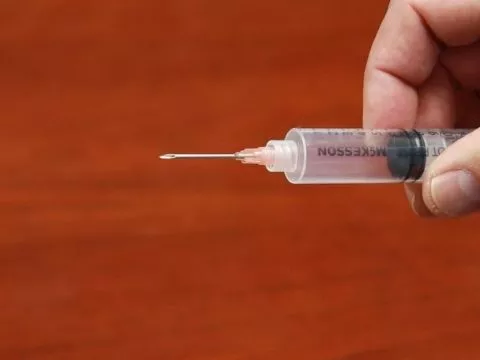 A hypodermic needle.