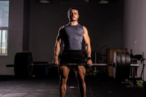 A lifter over the age of 40 deadlifting in the gym.