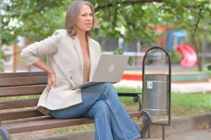 A woman with back pain who has been avoiding physical therapy.